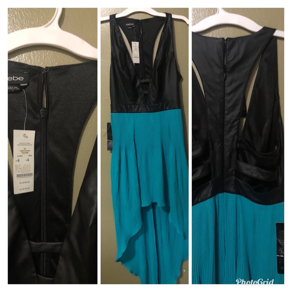 Woman’s black in teal dress